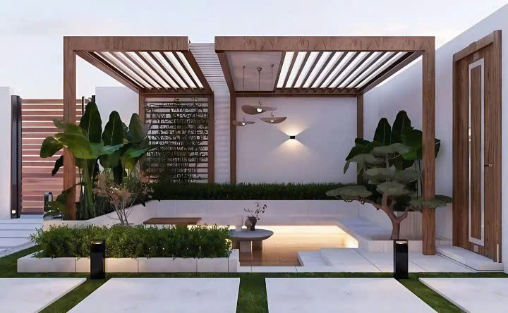 7 Bước Thiết Kế Không Gian Thiền Định Trong Sân Vườn 3 Không gian thiền định sân vườn với giàn gỗ, sàn lát đá và cây xanh tạo cảm giác kết nối chân với đất.