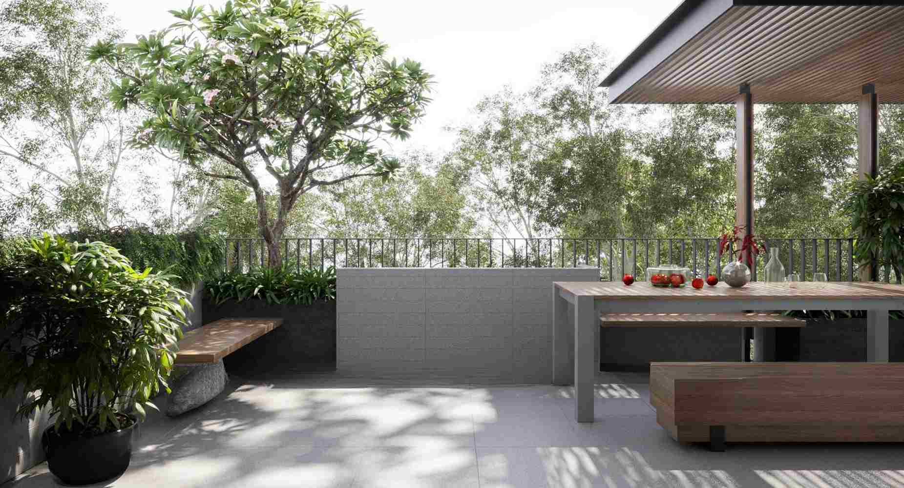 Thiết kế tiểu cảnh sân thượng xanh mát với bàn ghế gỗ